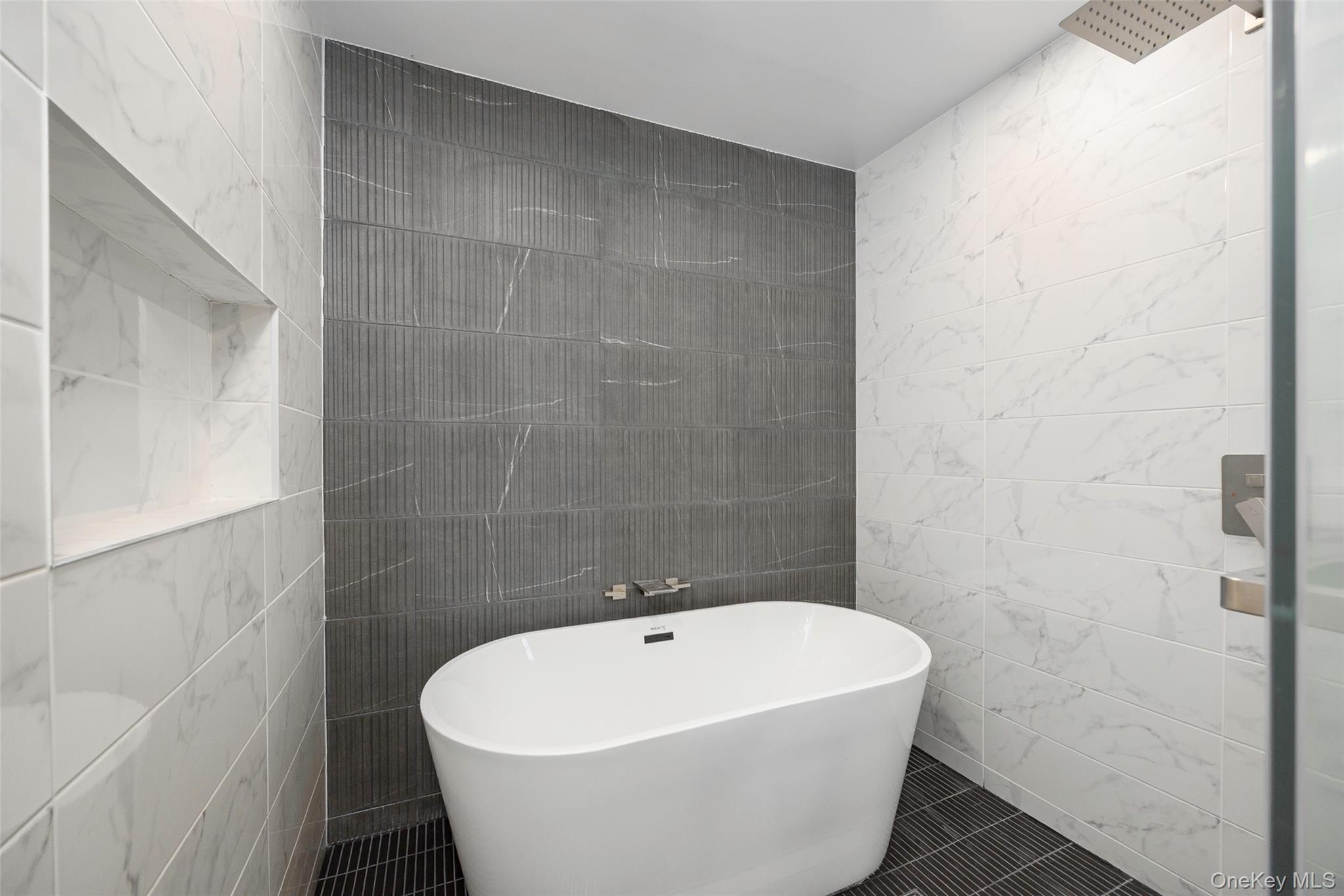 382 Slate Quarry Road Rhinebeck, NY 12572 - Photo 18 of 31 a white bath tub sitting in a bathroom