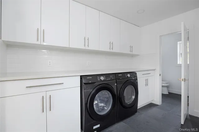 a bathroom with a black shower