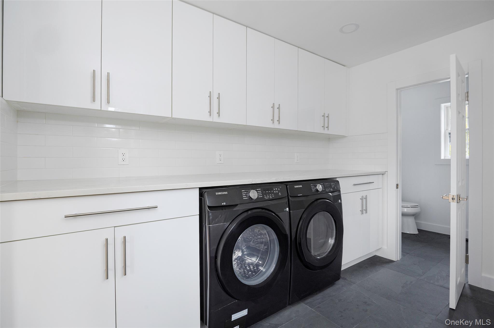 382 Slate Quarry Road Rhinebeck, NY 12572 - Photo 21 of 31 a utility room with dryer and washer