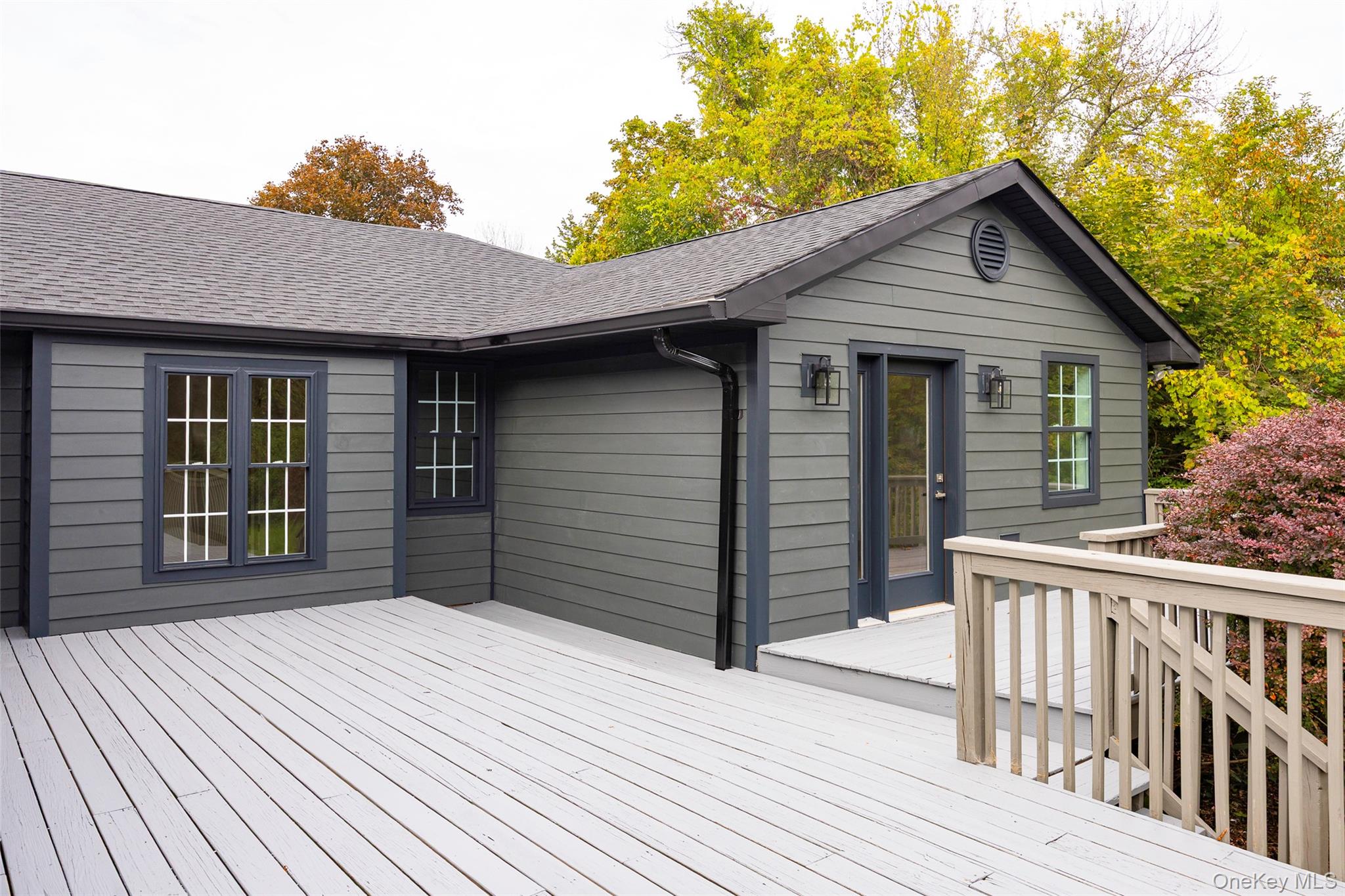382 Slate Quarry Road Rhinebeck, NY 12572 - Photo 25 of 31 a front view of a house with a balcony