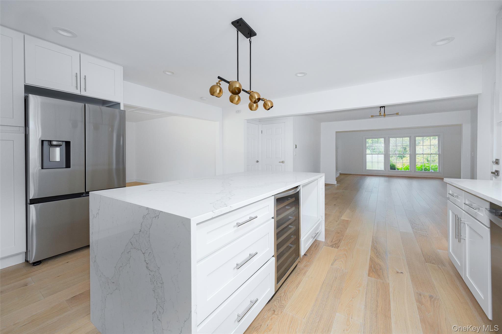 382 Slate Quarry Road Rhinebeck, NY 12572 - Photo 8 of 31 a kitchen that has a lot of cabinets and wooden floor