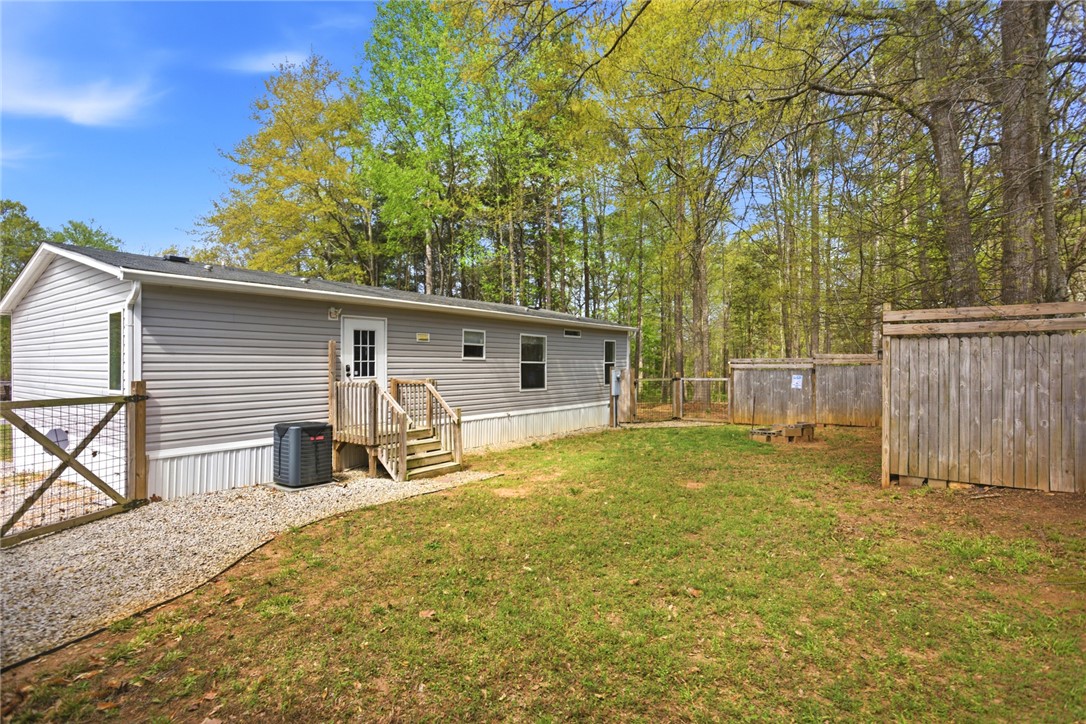 240 Southeast 147 Seneca, SC 29678 - Photo 4 of 27 This tranquil property features a spacious yard and inviting outdoor spaces.