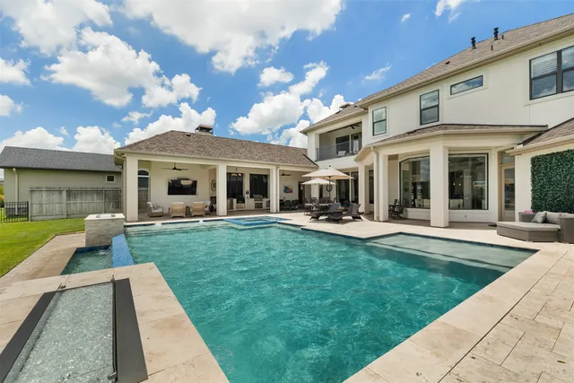 a view of a yard with a patio