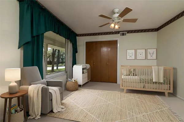 a view of an empty room with a window