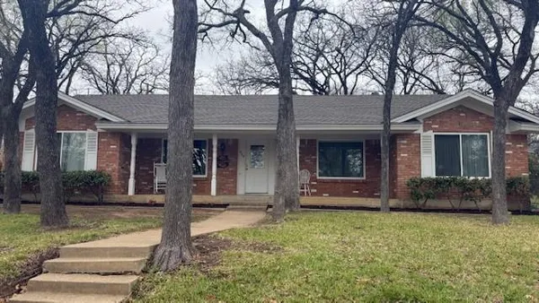 a front view of a building with street view