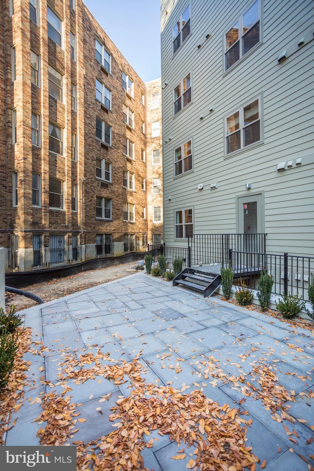 2434 16th Street Northwest, Unit 301 Washington, DC 20009 - Photo 30 of 30 a view of a building with many windows