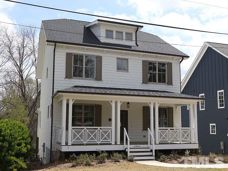 2004 Wiggs Street Raleigh, NC 27608 - Photo 1 of 25 a front view of a house with windows