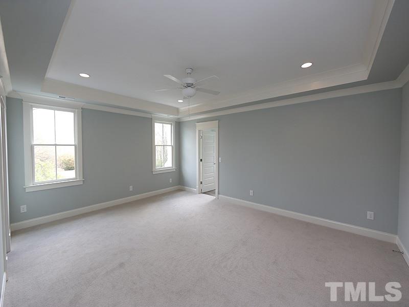 2004 Wiggs Street Raleigh, NC 27608 - Photo 16 of 25 an empty room with windows and closet
