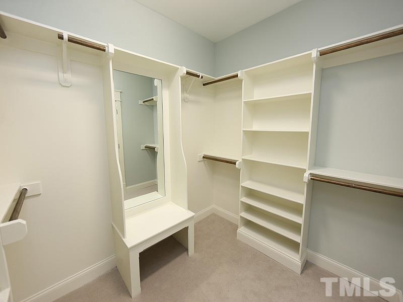2004 Wiggs Street Raleigh, NC 27608 - Photo 19 of 25 a view of walk in closet with empty racks