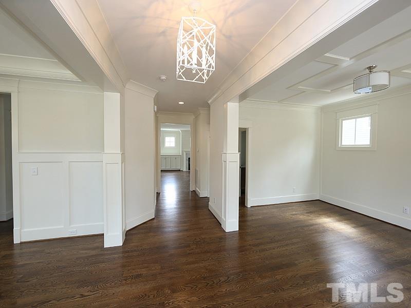 2004 Wiggs Street Raleigh, NC 27608 - Photo 3 of 25 a view of a hallway with wooden floor