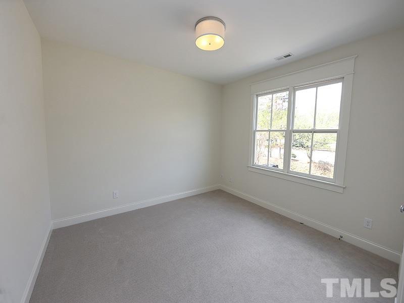 2004 Wiggs Street Raleigh, NC 27608 - Photo 22 of 25 an empty room with a window