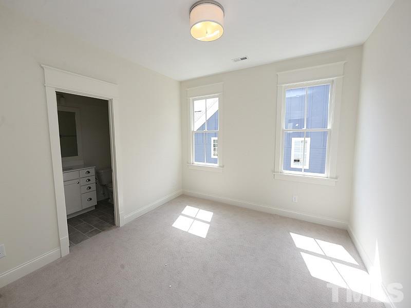 2004 Wiggs Street Raleigh, NC 27608 - Photo 23 of 25 a view of empty room with window and bathroom