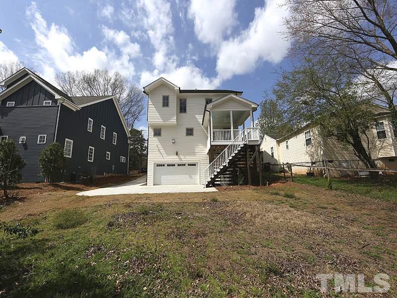 2004 Wiggs Street Raleigh, NC 27608 - Photo 25 of 25 a view of a house with a yard