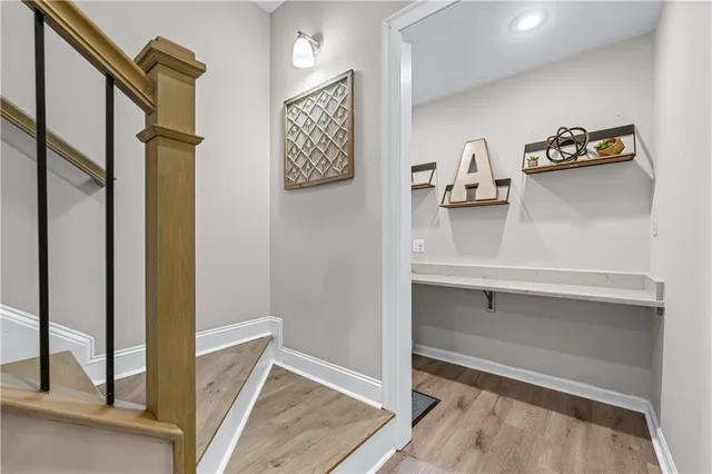 a view of storage and utility room with closet