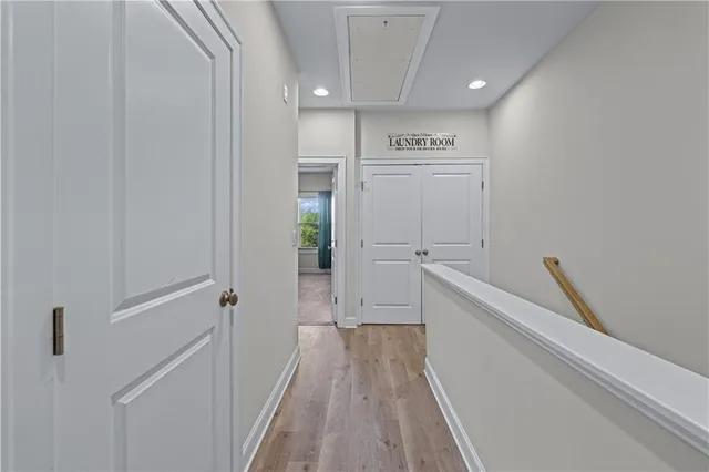 a view of a hallway with closet
