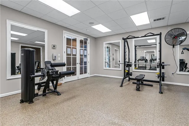 a view of a livingroom with furniture and a window