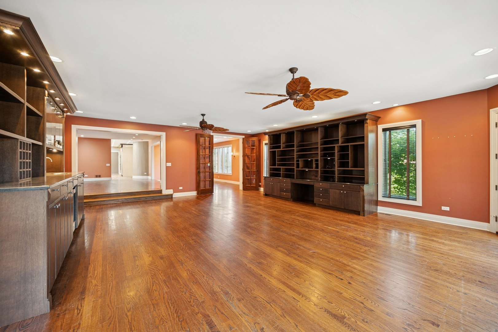 1505 Landwehr Road Northbrook, IL 60062 - Photo 7 of 38 a view of empty room with wooden floor and fan