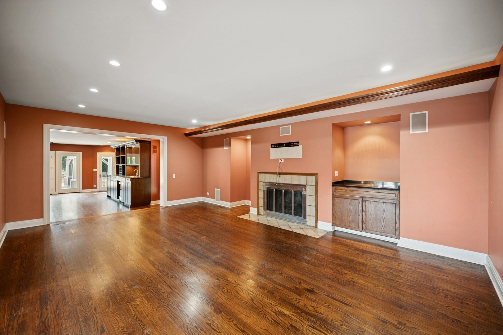 1505 Landwehr Road Northbrook, IL 60062 - Photo 8 of 38 a view of a livingroom with wooden floor and a fireplace