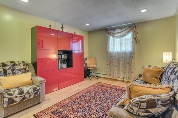 34 Westgate Road, Unit 5 Boston, MA 02467 - Photo 13 of 18 a living room with furniture