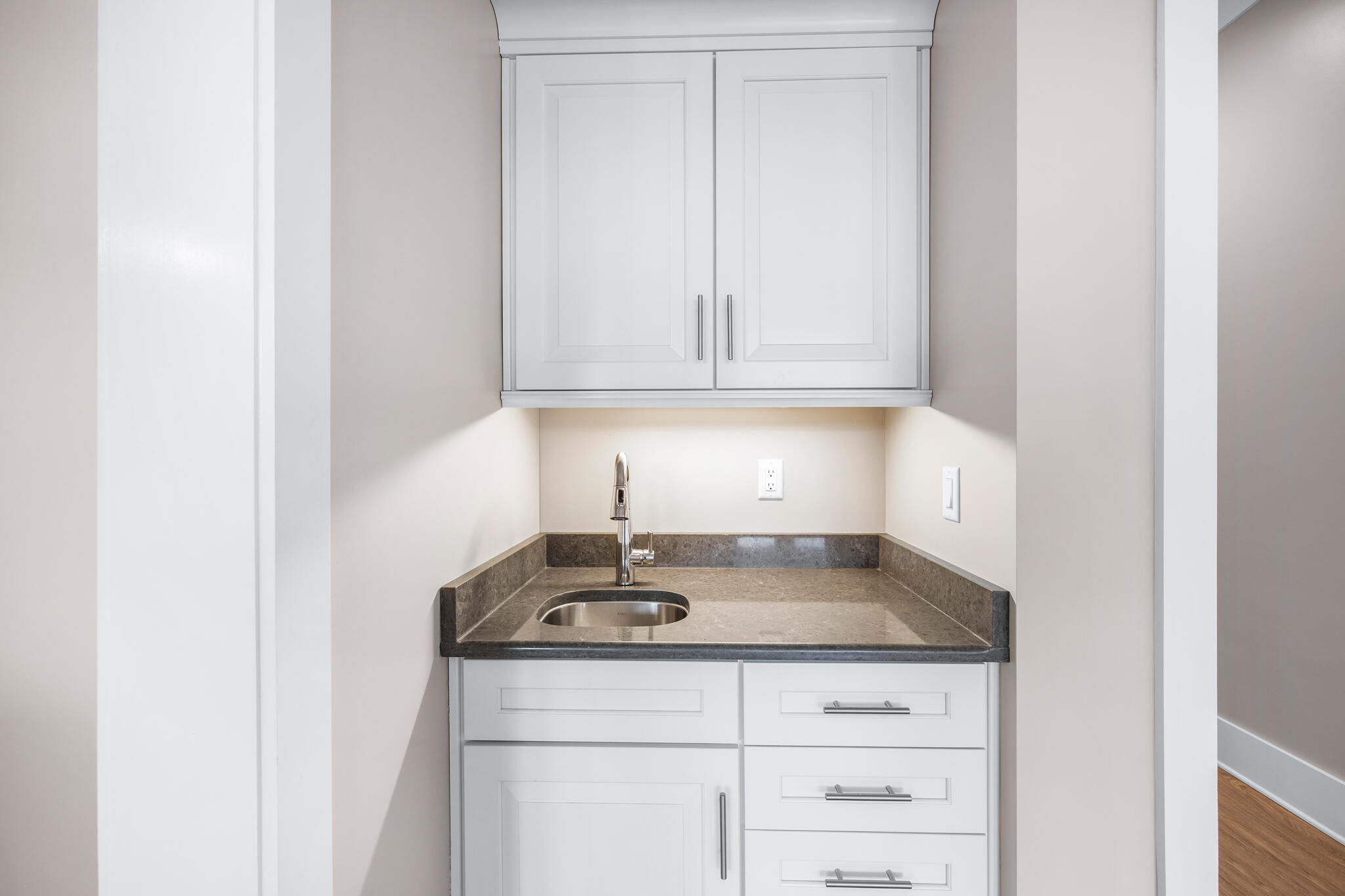 61 Blue Lake Road Santa Rosa Beach, FL 32459 - Photo 17 of 66 a kitchen with a sink and cabinets