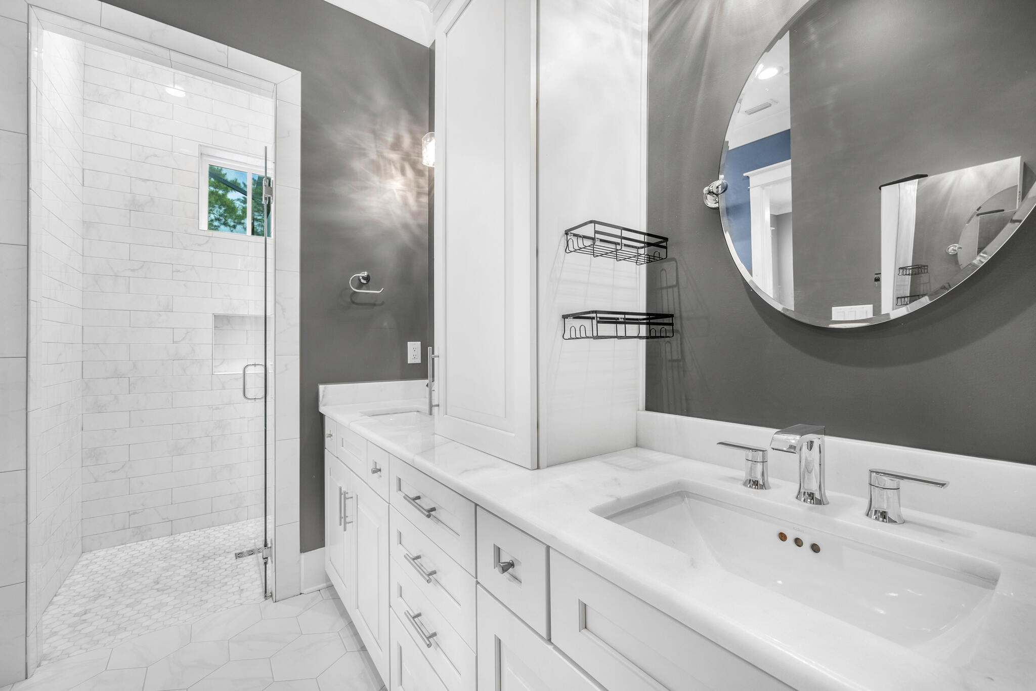 61 Blue Lake Road Santa Rosa Beach, FL 32459 - Photo 21 of 66 a bathroom with a double vanity sink and a mirror
