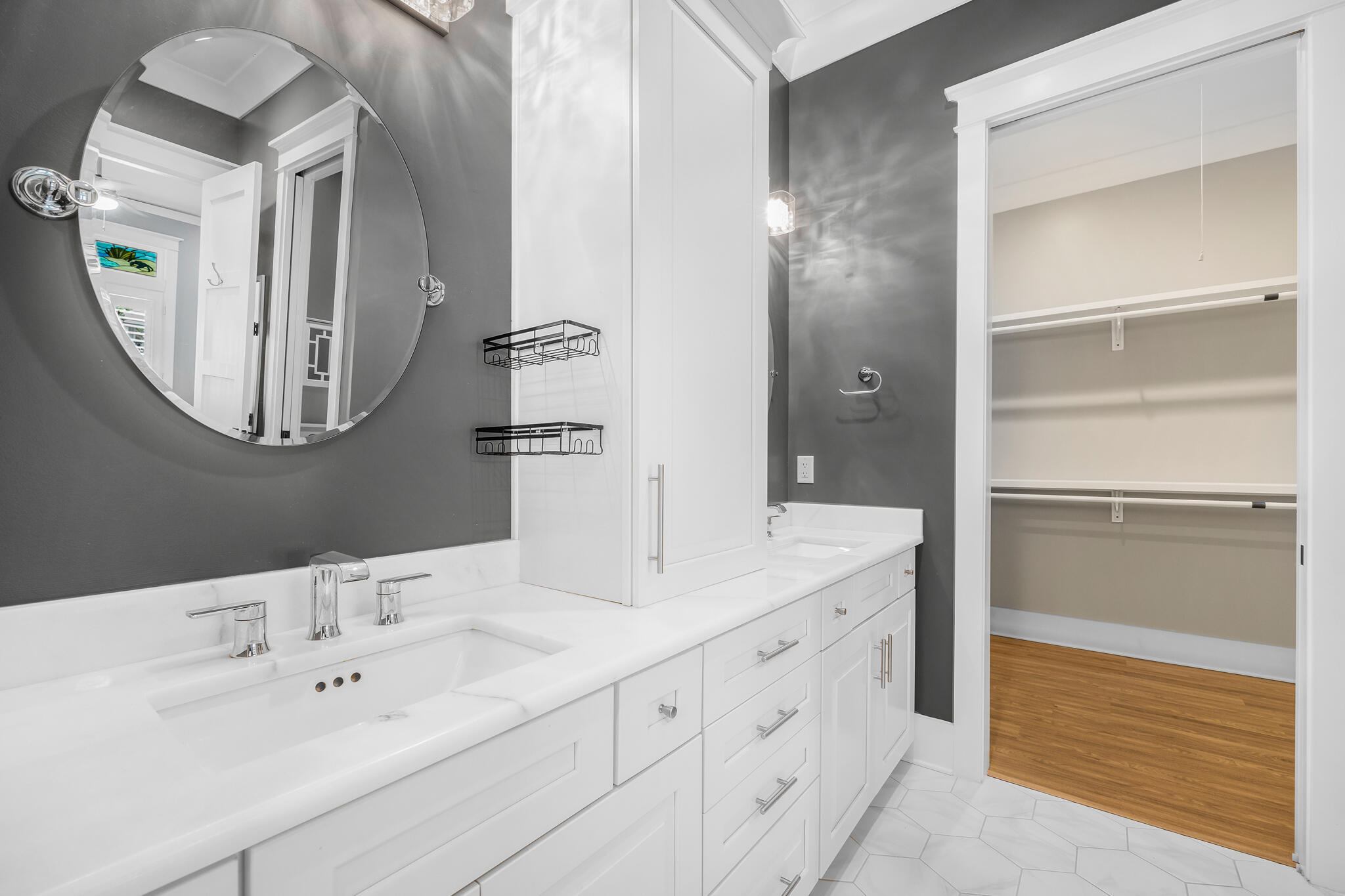 61 Blue Lake Road Santa Rosa Beach, FL 32459 - Photo 22 of 66 a bathroom with a double vanity sink and a mirror