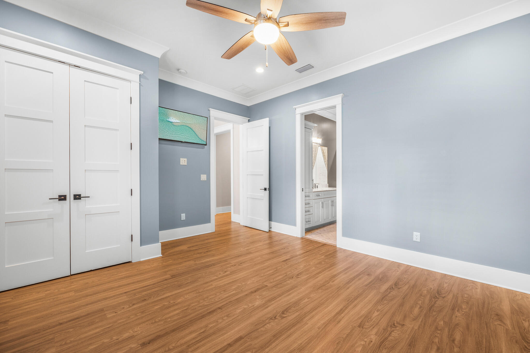 61 Blue Lake Road Santa Rosa Beach, FL 32459 - Photo 27 of 66 wooden floor in an empty room with a window