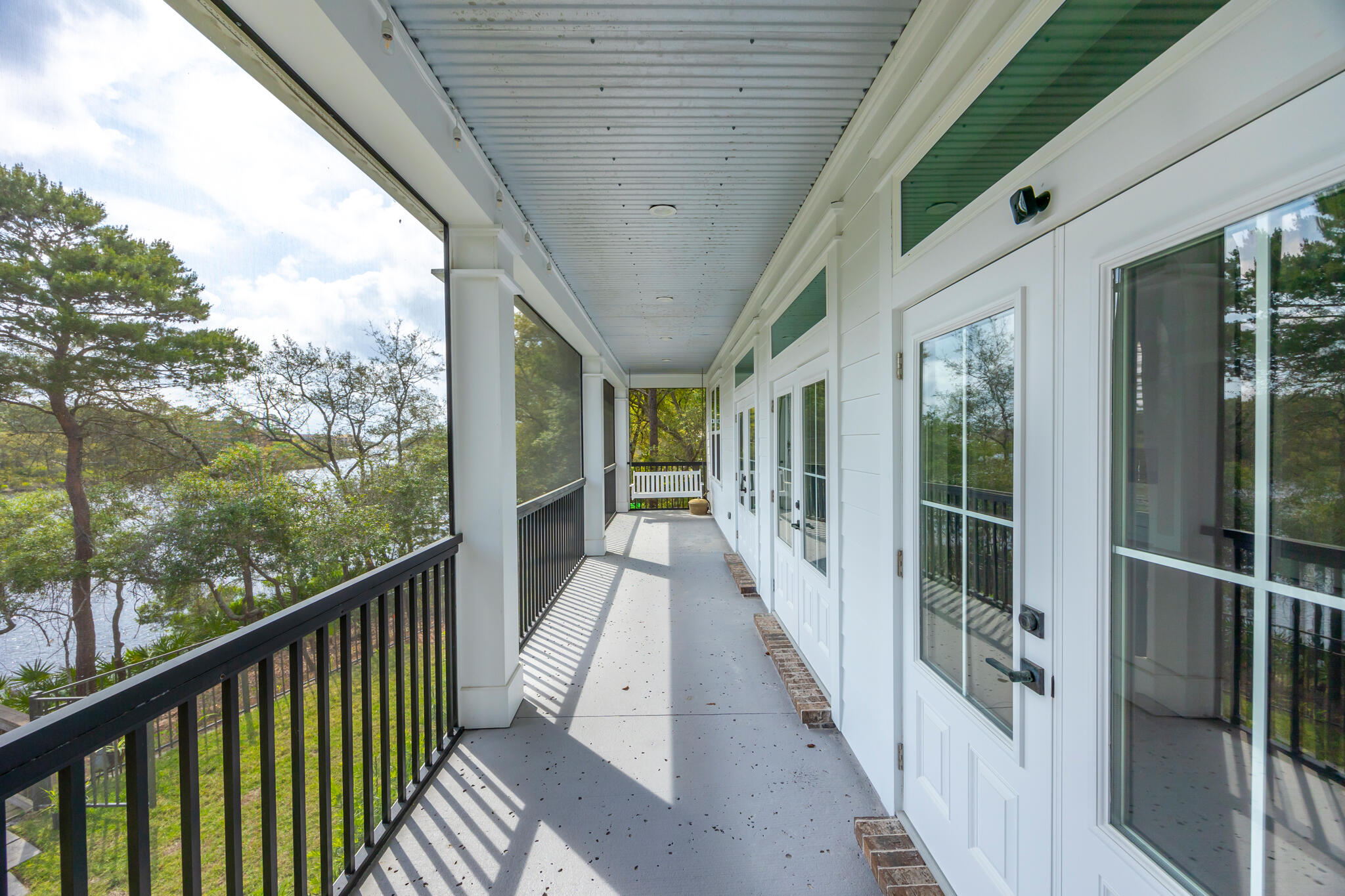 61 Blue Lake Road Santa Rosa Beach, FL 32459 - Photo 36 of 66 a view of a balcony