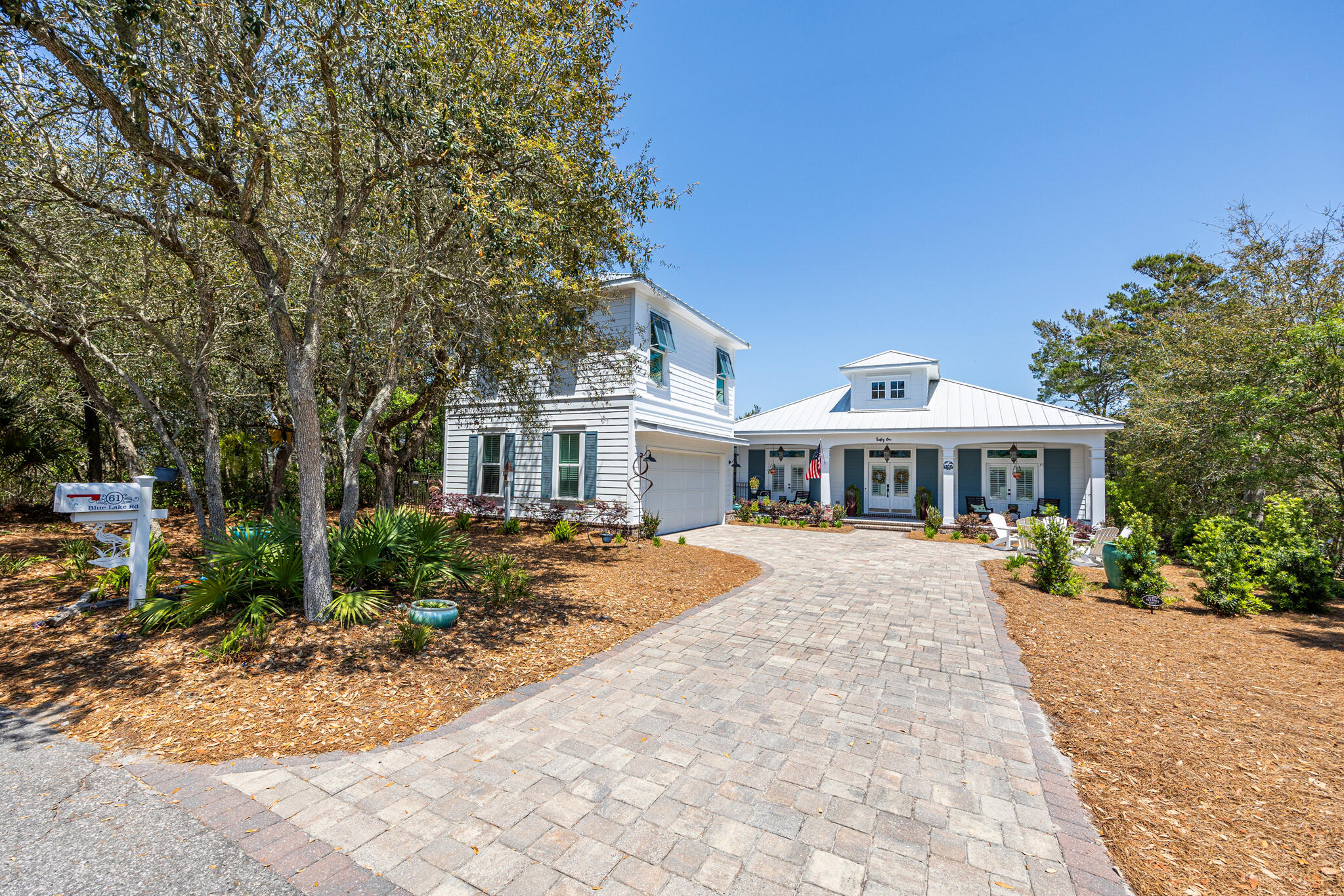 61 Blue Lake Road Santa Rosa Beach, FL 32459 - Photo 48 of 66 a view of a house with yard and tree s