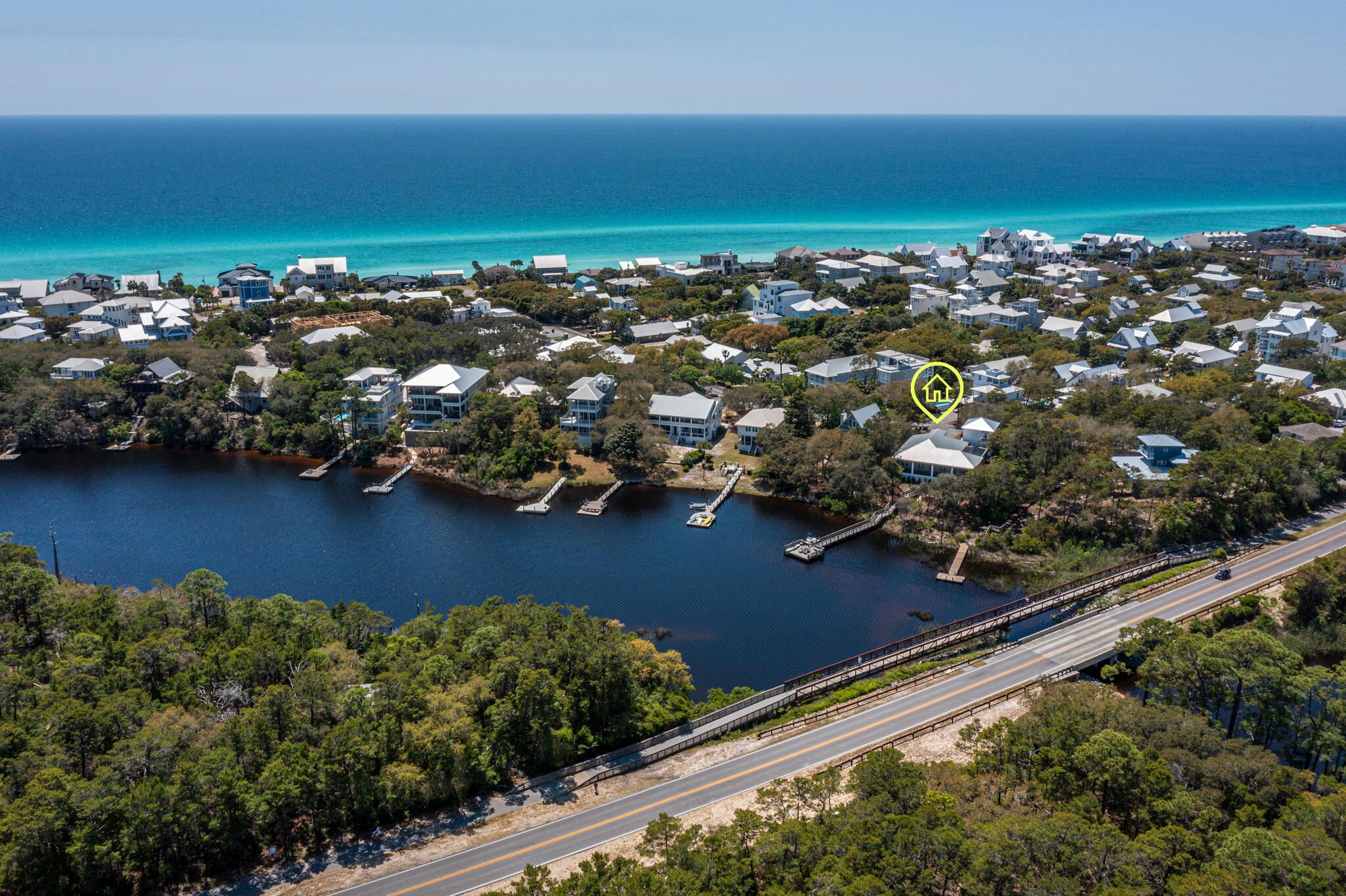 61 Blue Lake Road Santa Rosa Beach, FL 32459 - Photo 64 of 66 an aerial view of ocean and residential houses with outdoor space