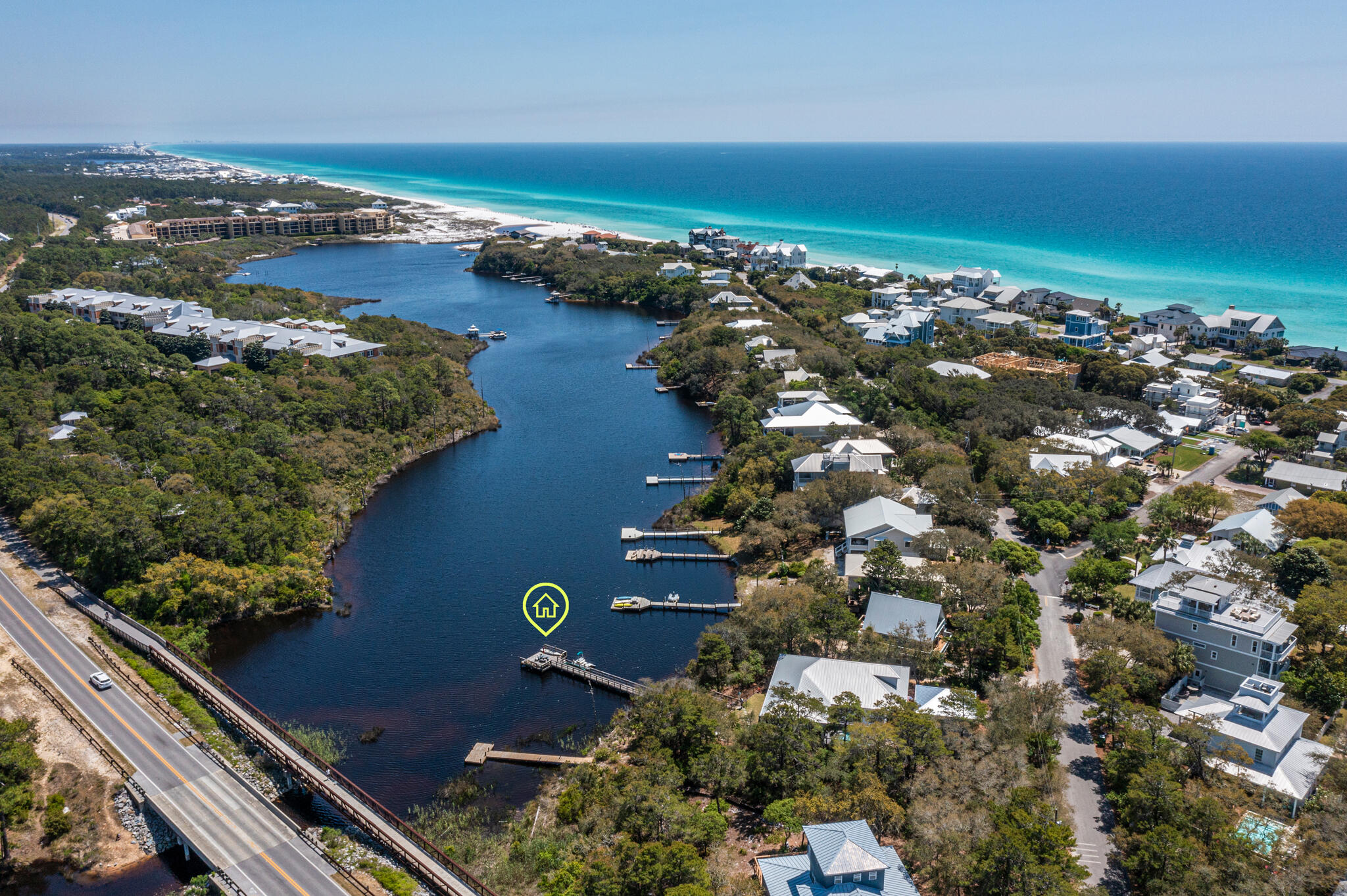 61 Blue Lake Road Santa Rosa Beach, FL 32459 - Photo 65 of 66 an aerial view of ocean and residential houses with outdoor space
