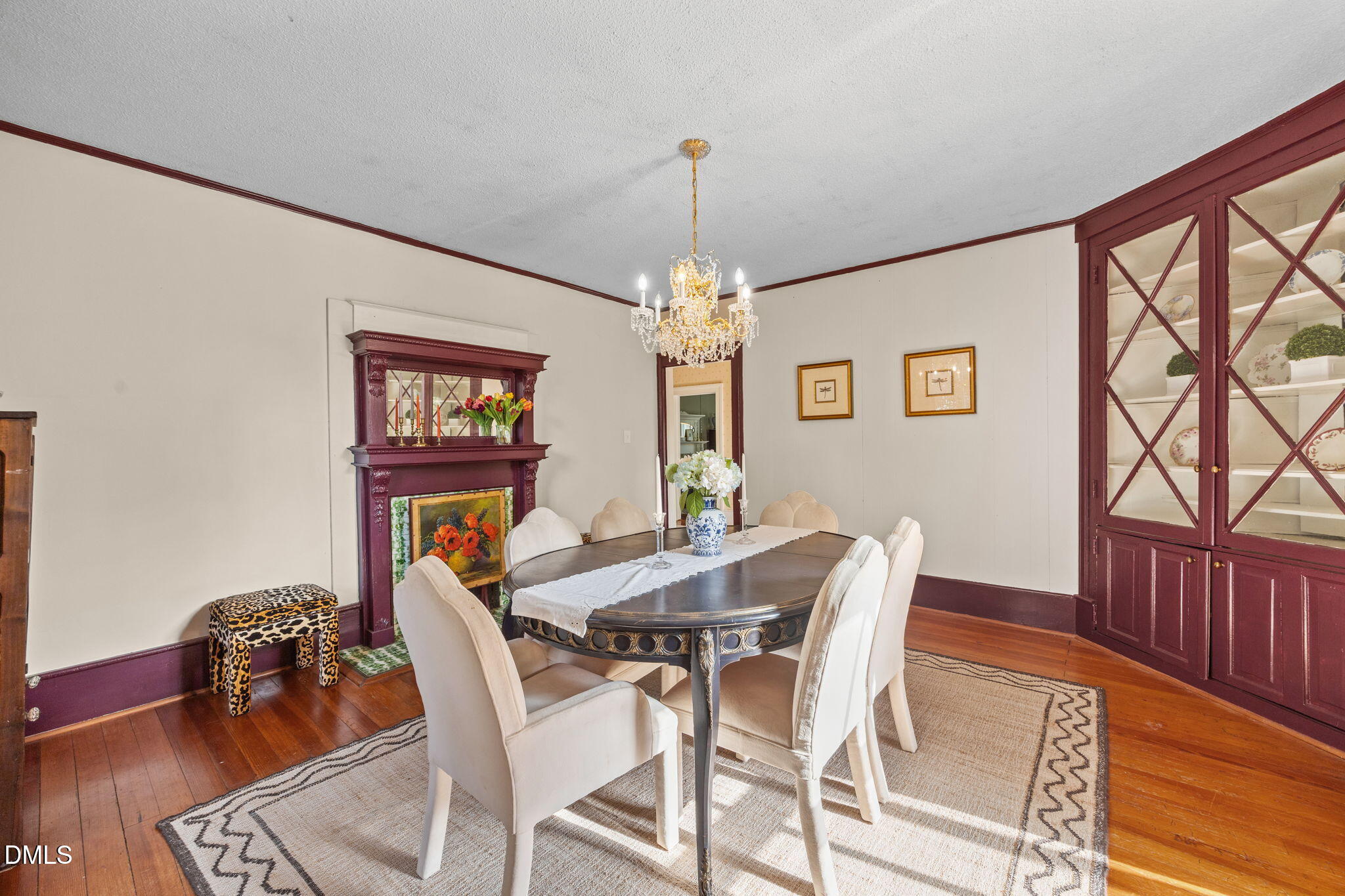 554 South Main Street Wake Forest, NC 27587 - Photo 20 of 78 a dining room with furniture a chandelier and wooden floor