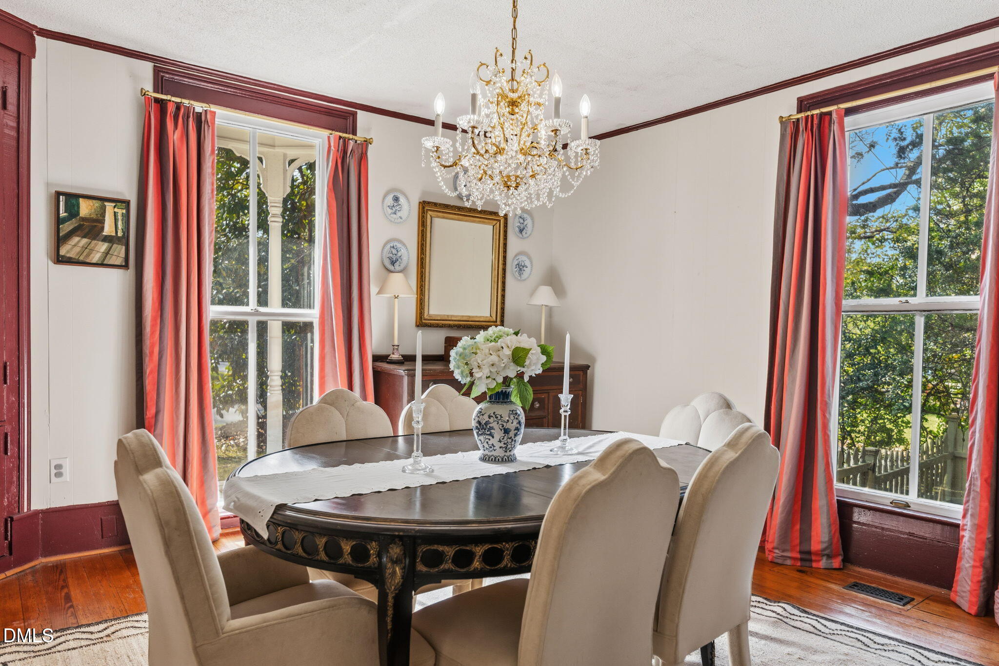 554 South Main Street Wake Forest, NC 27587 - Photo 21 of 78 a dining room with furniture a large window and wooden floor