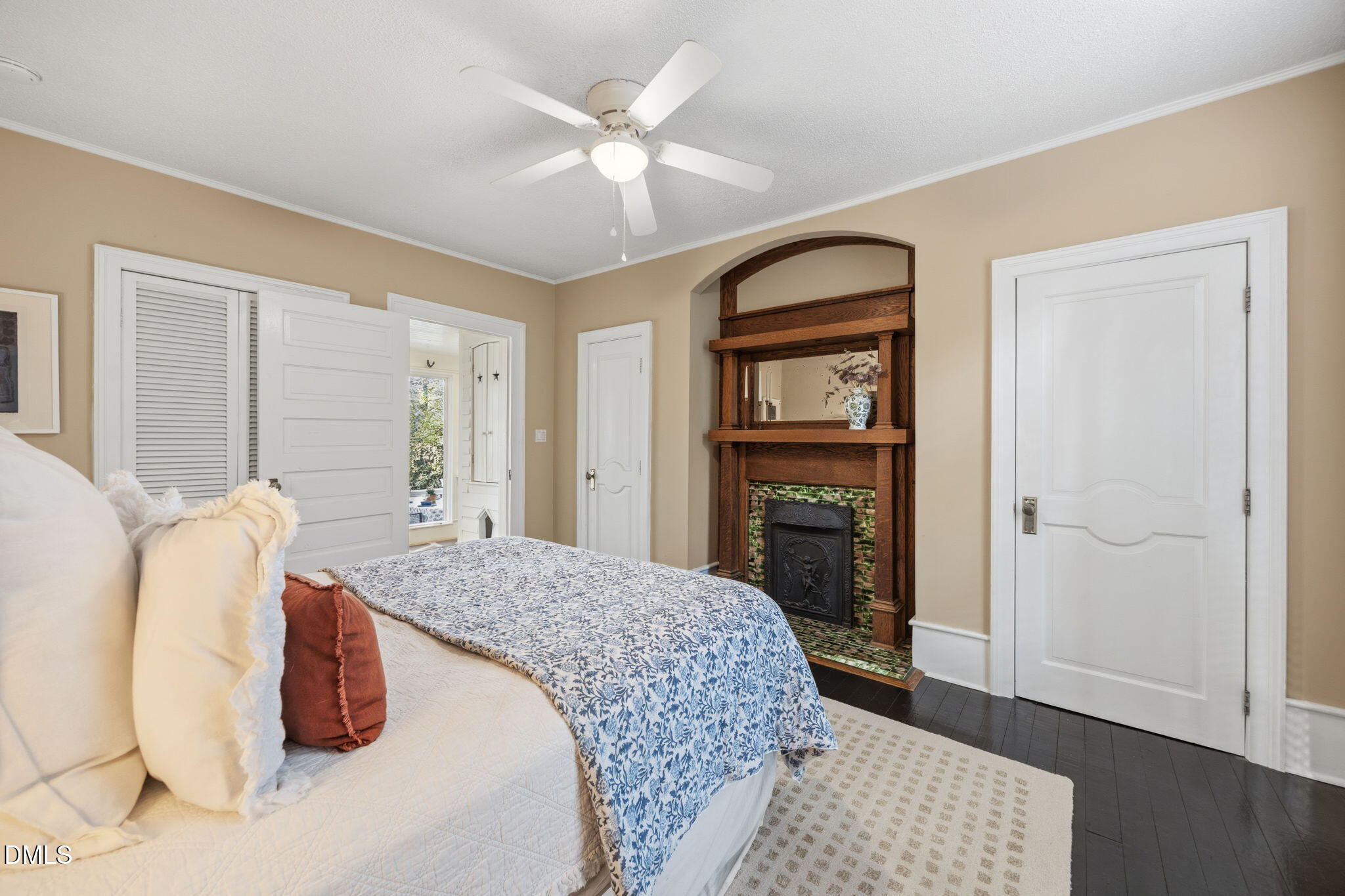 554 South Main Street Wake Forest, NC 27587 - Photo 26 of 78 a bedroom with a large bed and a fireplace