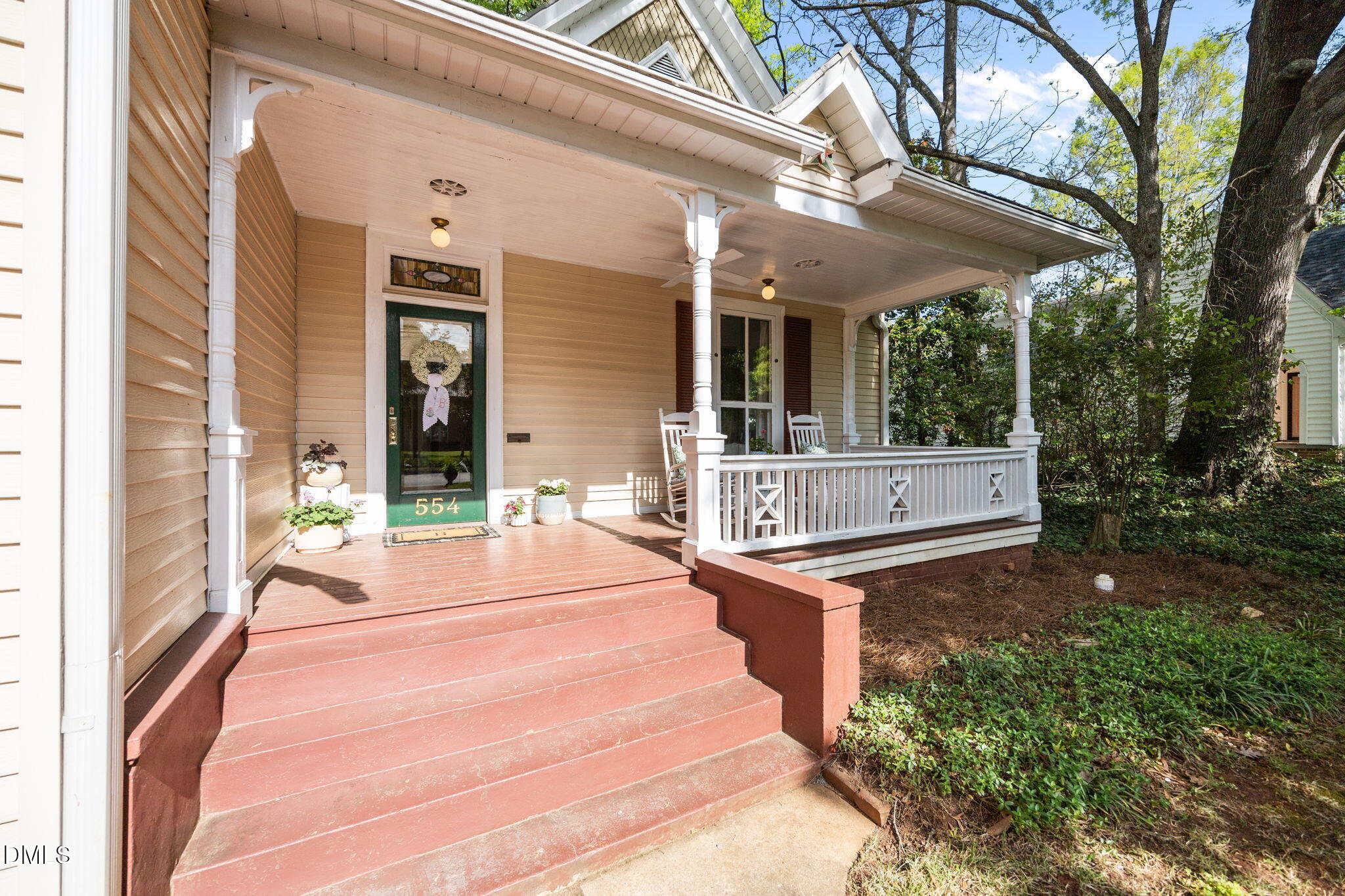 554 South Main Street Wake Forest, NC 27587 - Photo 5 of 78 a view of a chairs and table in the patio with a backyard
