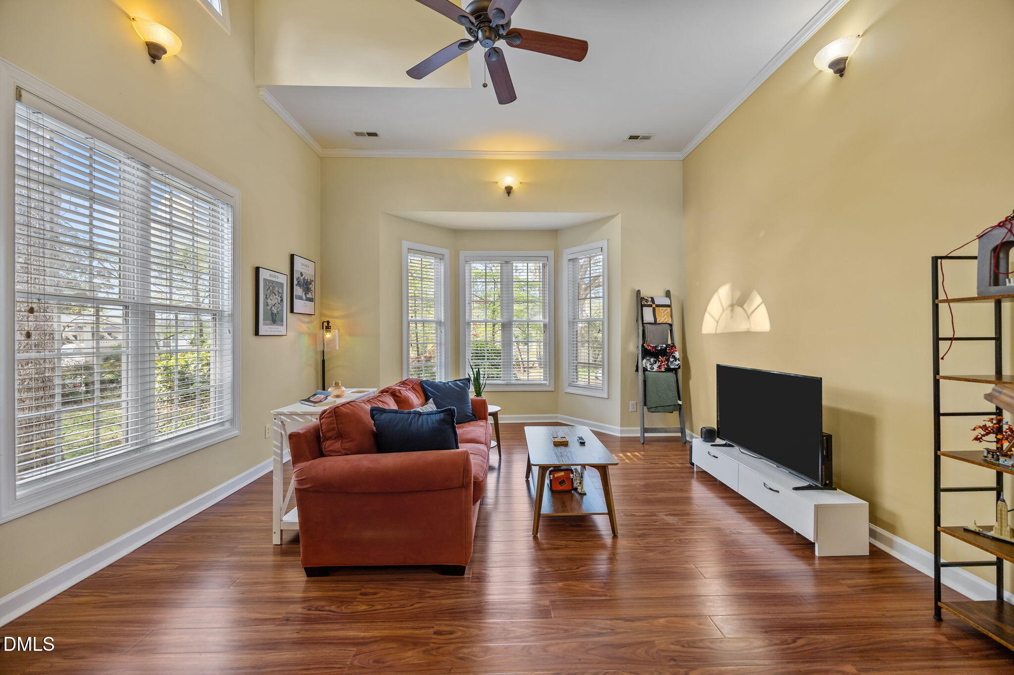 554 South Main Street Wake Forest, NC 27587 - Photo 58 of 78 a living room with furniture wooden floor and a large window