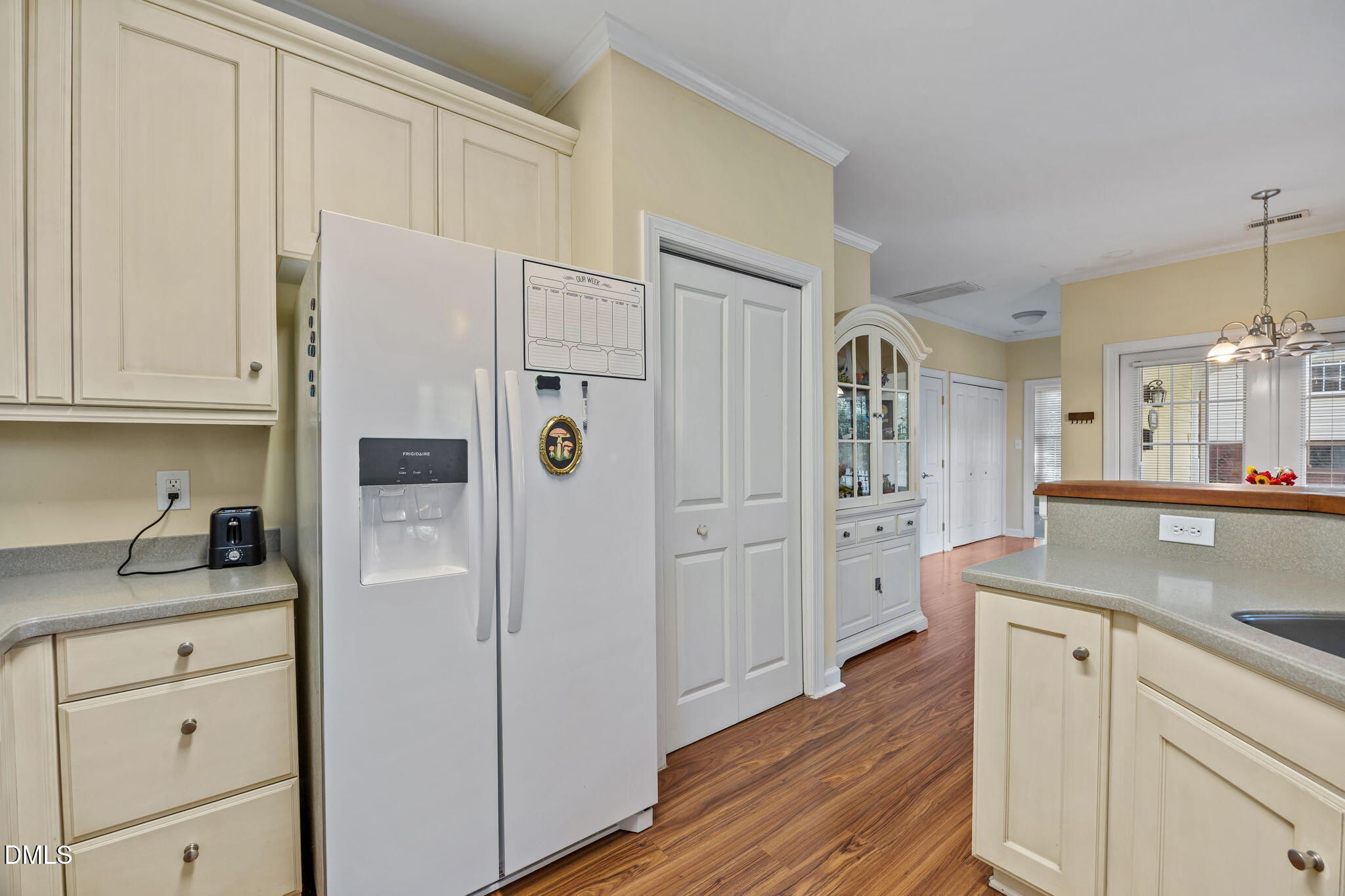 554 South Main Street Wake Forest, NC 27587 - Photo 65 of 78 a kitchen with white cabinets and refrigerator