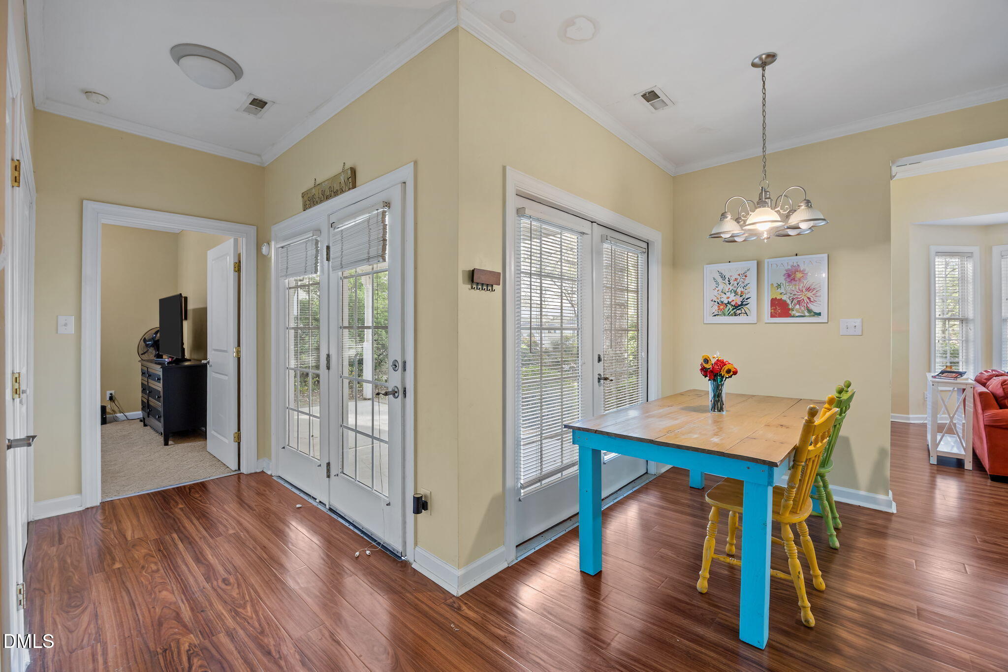 554 South Main Street Wake Forest, NC 27587 - Photo 67 of 78 a room with wooden floor and windows