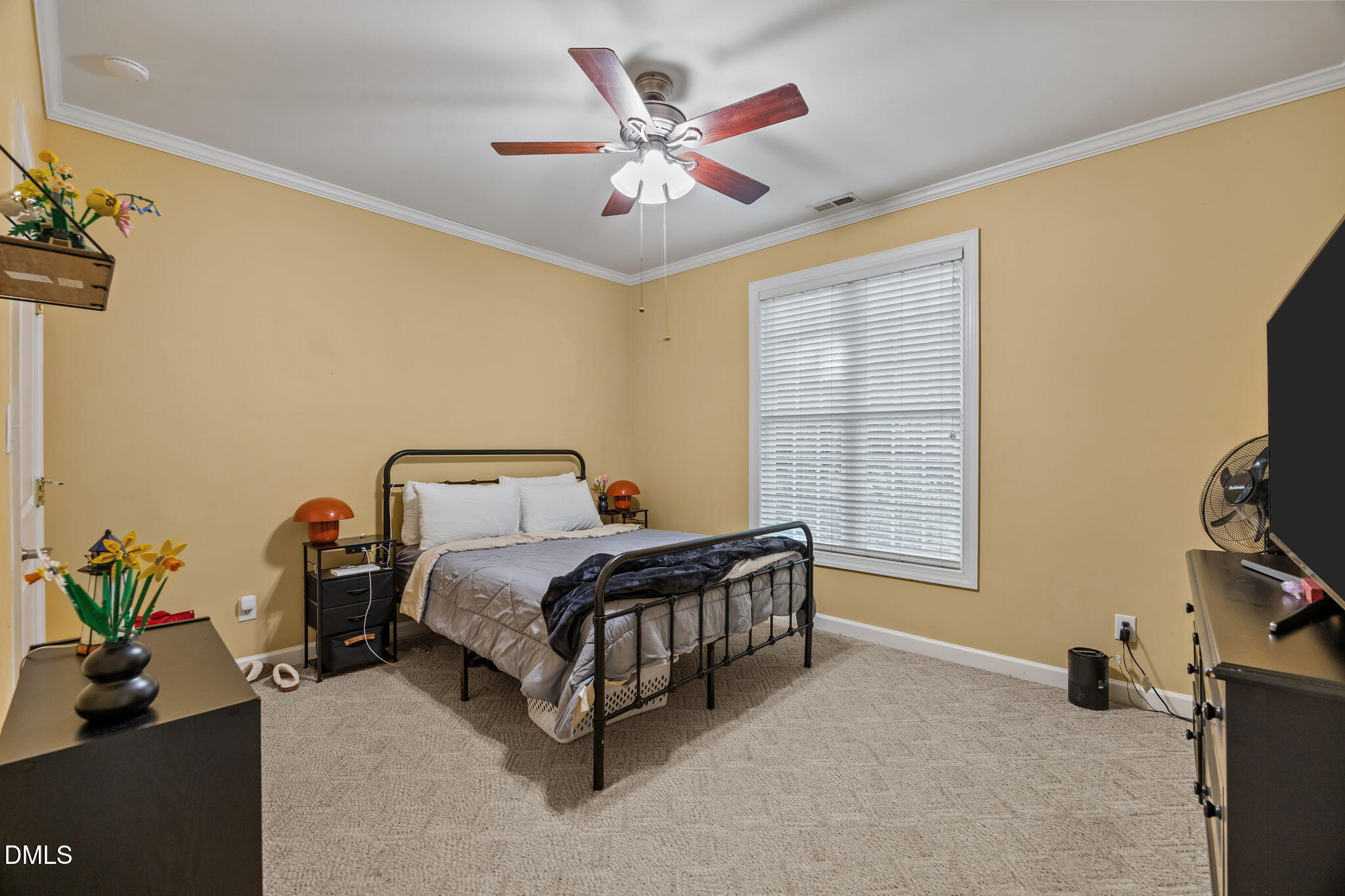 554 South Main Street Wake Forest, NC 27587 - Photo 68 of 78 a spacious bedroom with a bed and a window