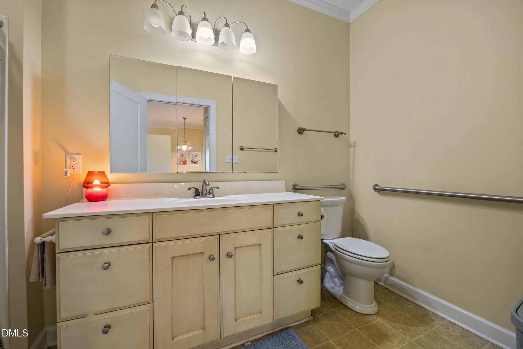 554 South Main Street Wake Forest, NC 27587 - Photo 70 of 78 a bathroom with a sink a toilet and mirror