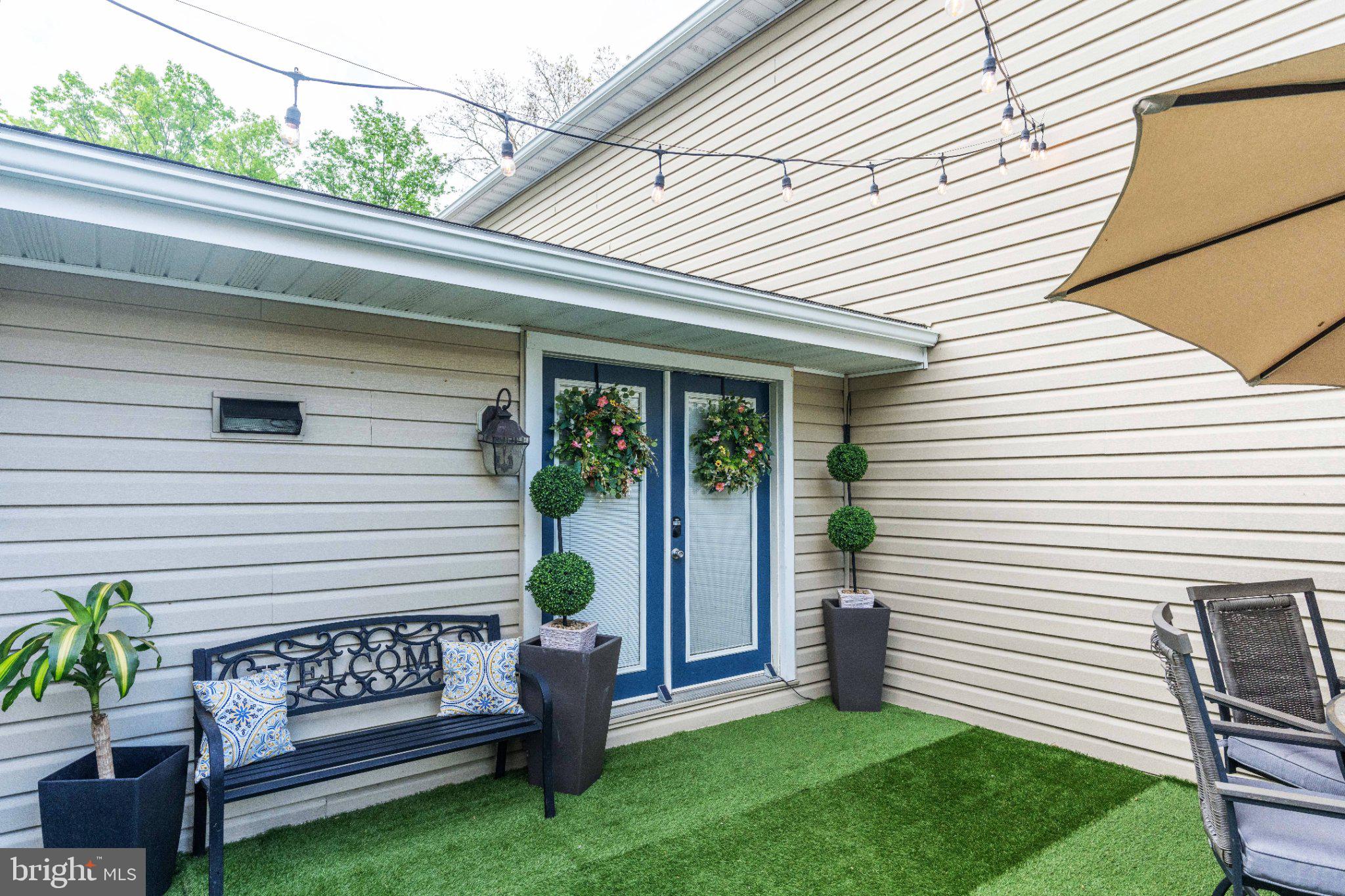 1002 Maple Lane Tyrone, PA 16686 - Photo 6 of 71 Charming entryway with lush greenery.