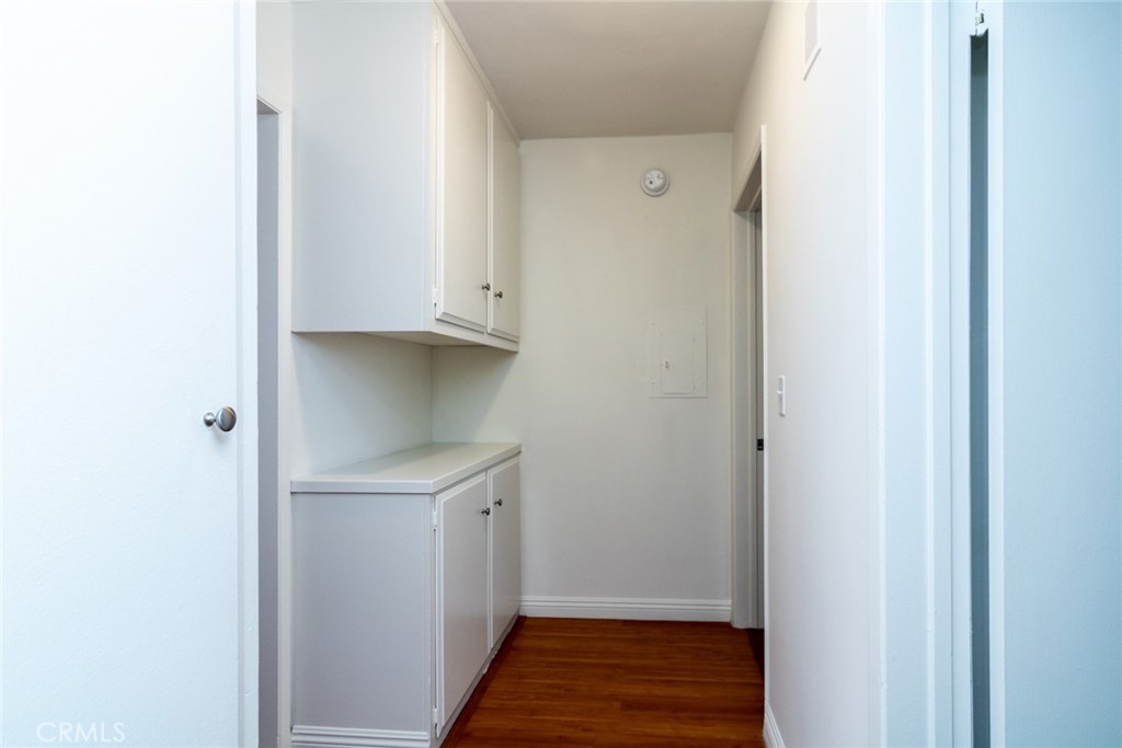 1122 9th Street, Unit 4 Santa Monica, CA 90403 - Photo 11 of 18 a view of walk in closet with wooden floor