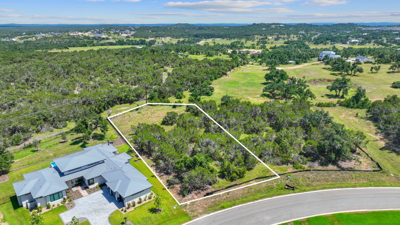 6505 Madrone Tree Lane Austin, TX 78738 - Photo 1 of 1 an aerial view of a residential houses with outdoor space and trees