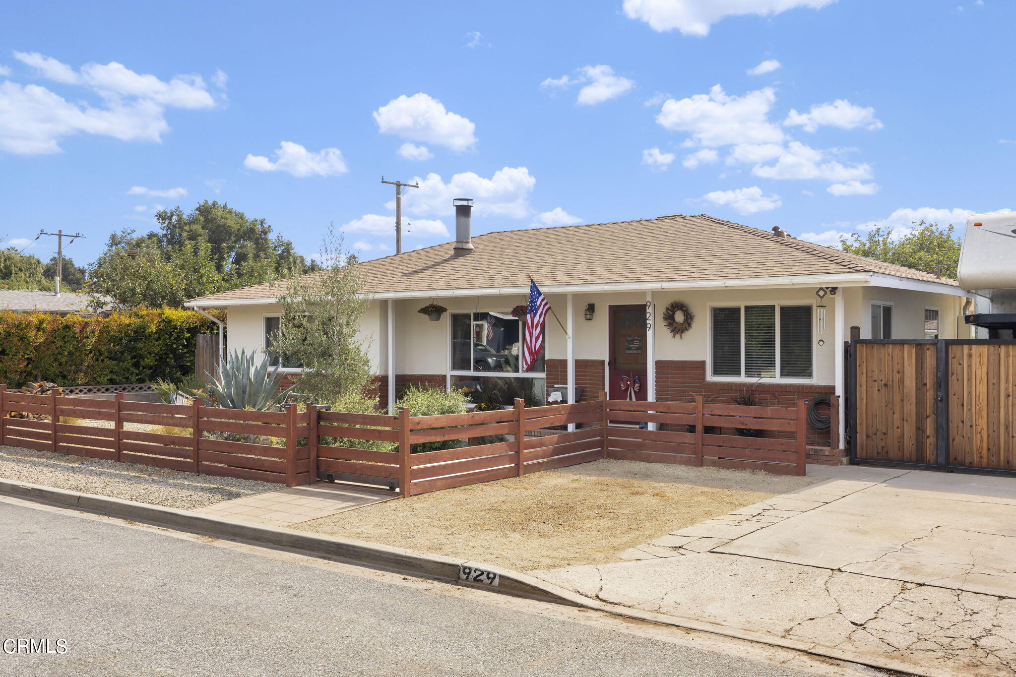 929 Devereux Drive Ojai, CA 93023 - Photo 4 of 40 a front view of house with yard outdoor seating and barbeque oven