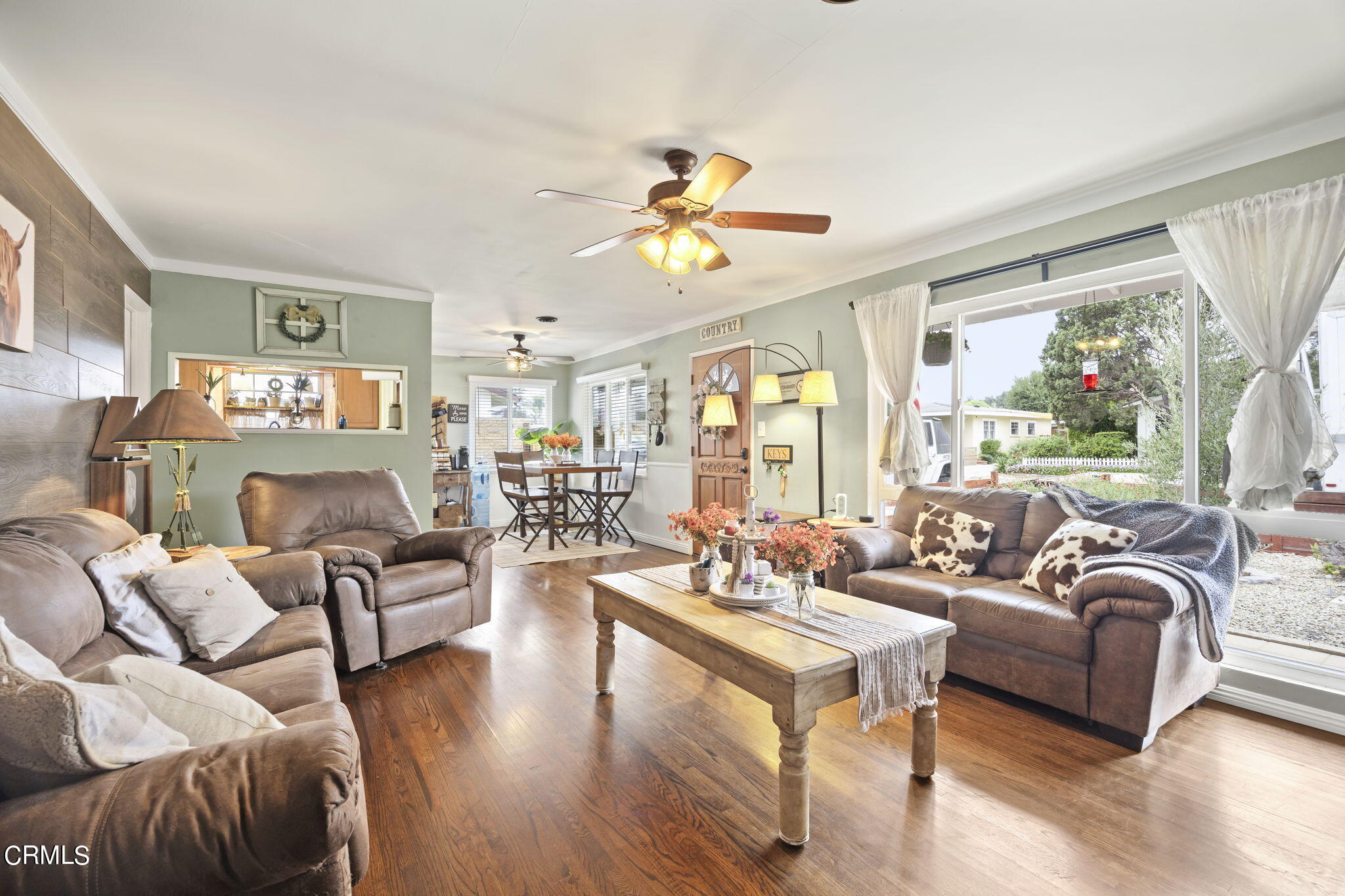 929 Devereux Drive Ojai, CA 93023 - Photo 9 of 40 a living room with furniture and a large window