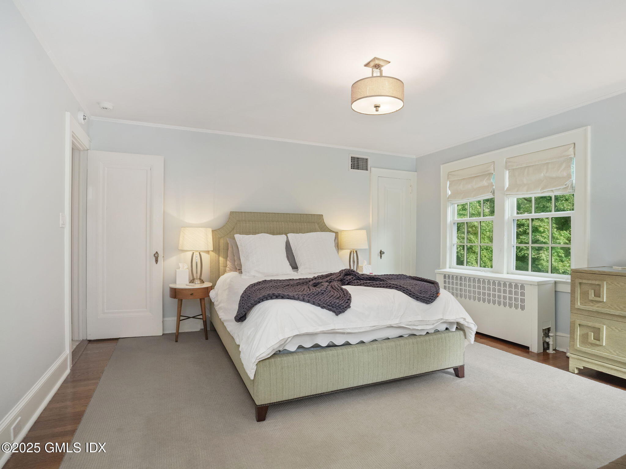 143 Lockwood Road Riverside, CT 06878 - Photo 17 of 39 a bedroom with a bed and a window