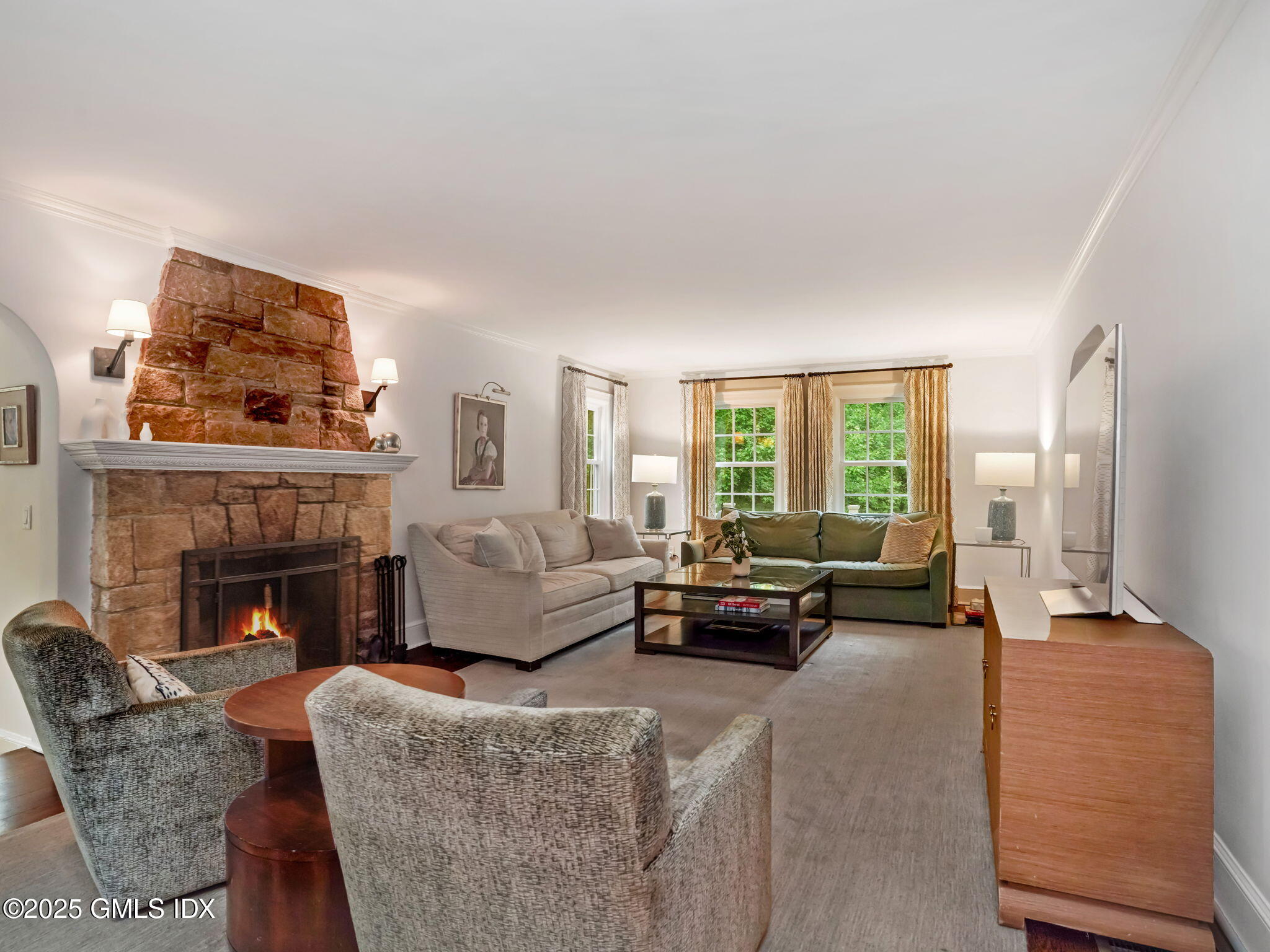 143 Lockwood Road Riverside, CT 06878 - Photo 2 of 39 a living room with furniture and a fireplace