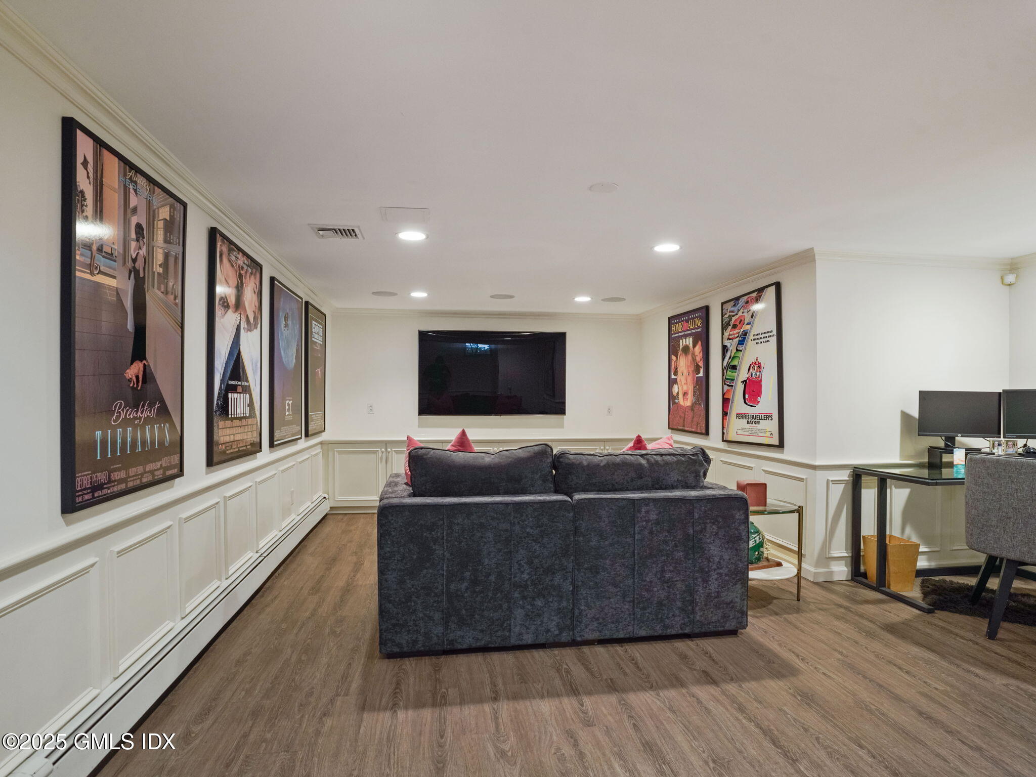 143 Lockwood Road Riverside, CT 06878 - Photo 23 of 39 a living room with furniture and a flat screen tv