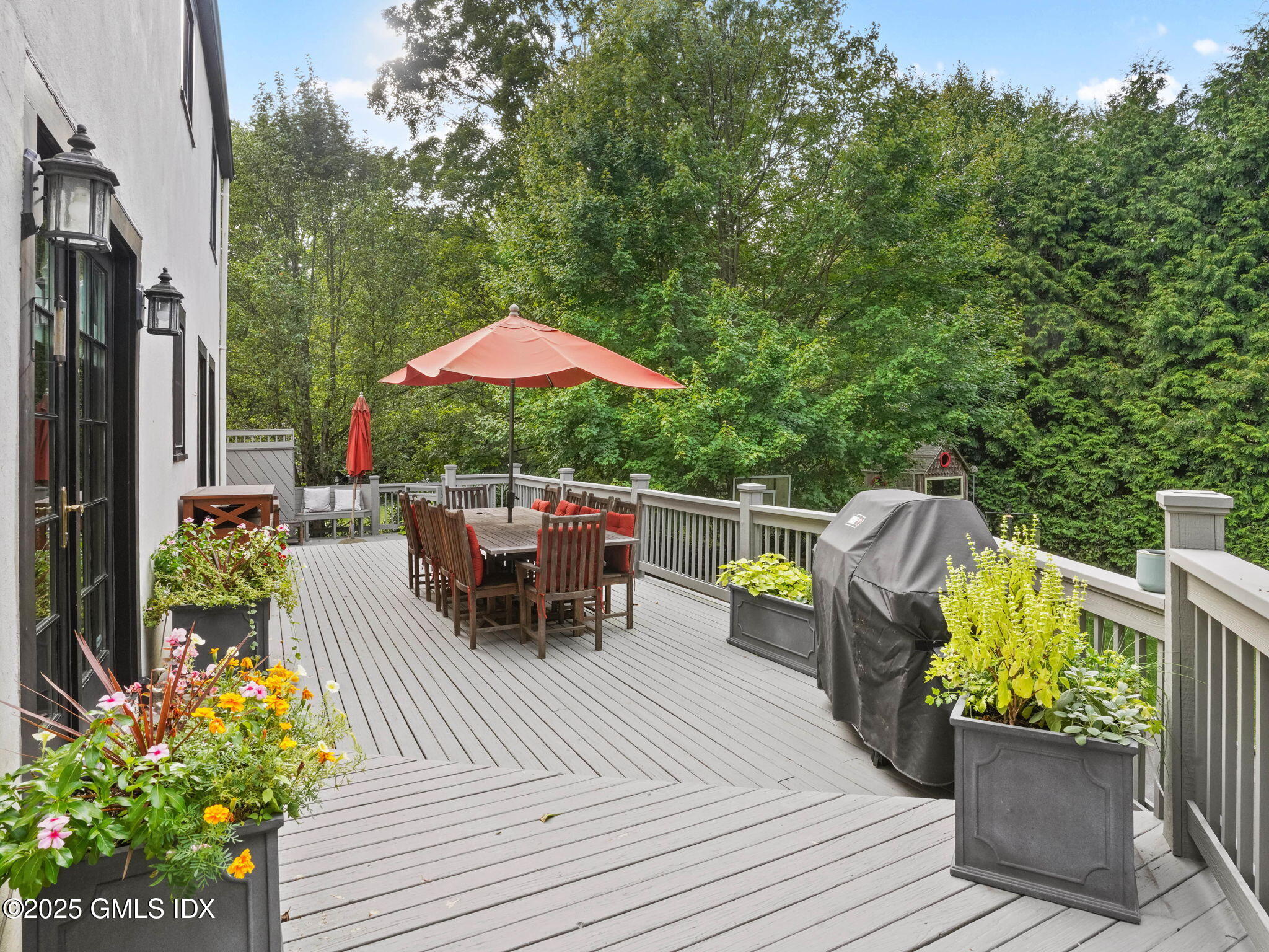143 Lockwood Road Riverside, CT 06878 - Photo 26 of 39 an outdoor space with furniture and garden