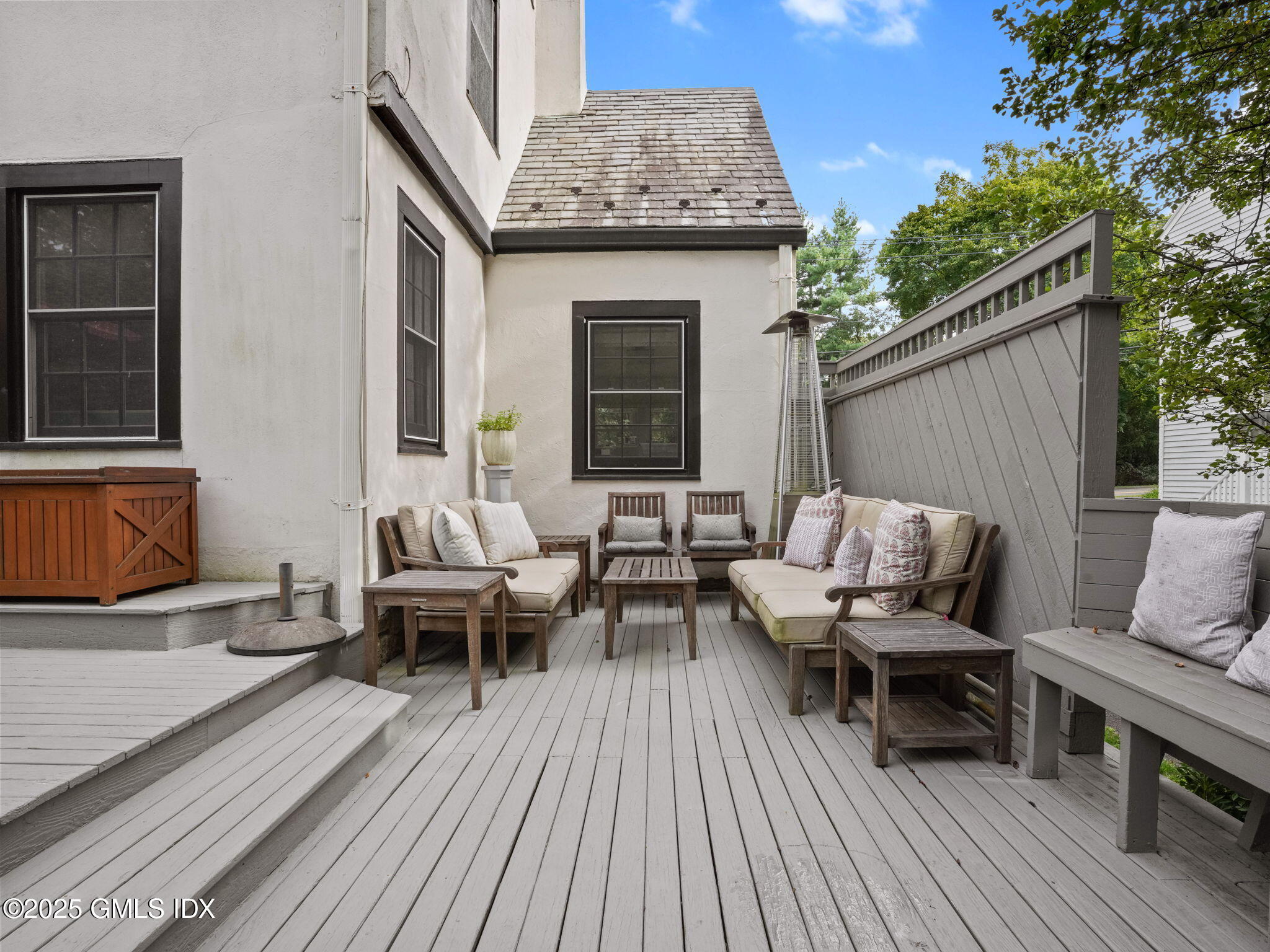 143 Lockwood Road Riverside, CT 06878 - Photo 28 of 39 a outdoor living space with furniture and wooden floor
